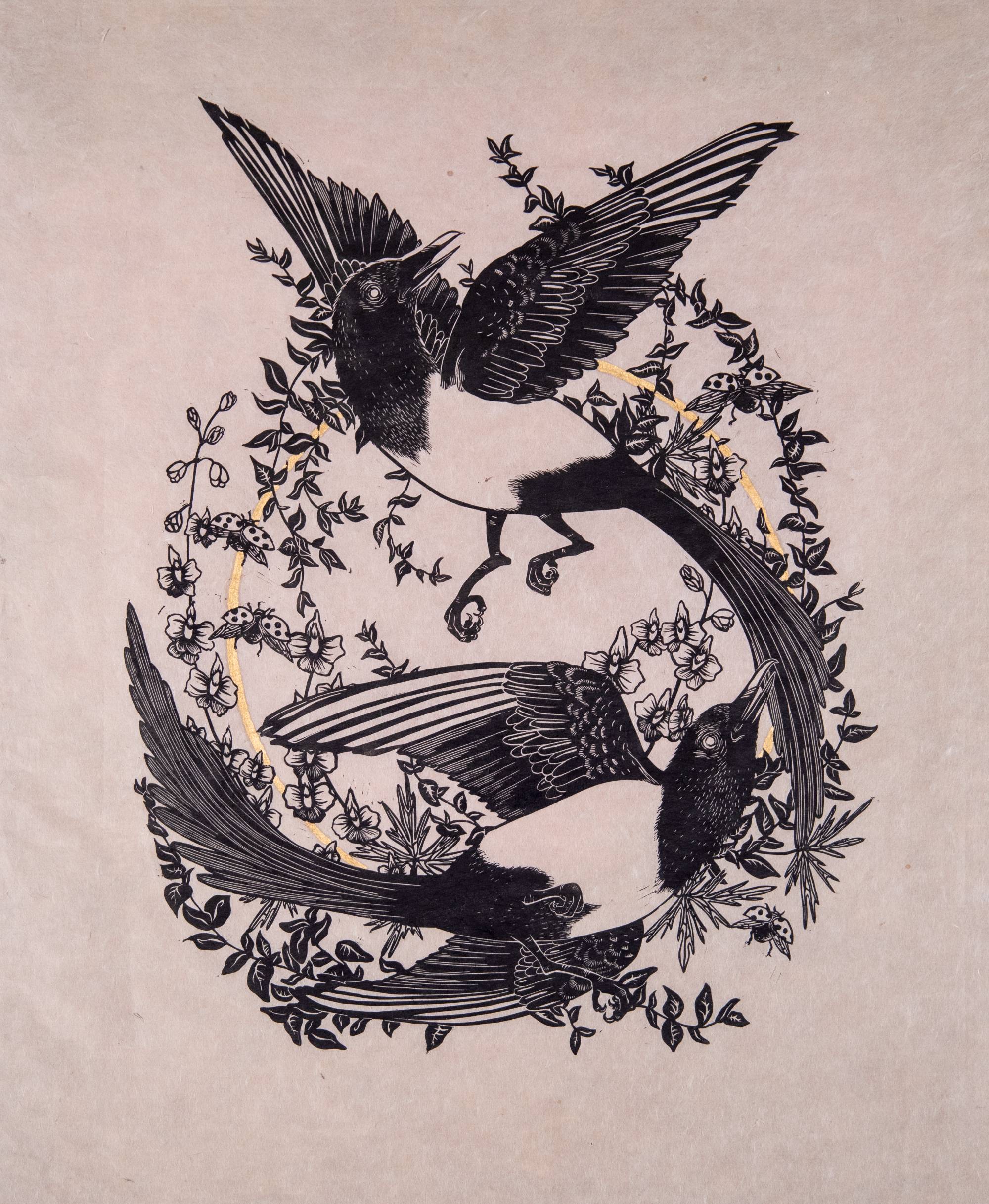 linocut print of two black birds circling